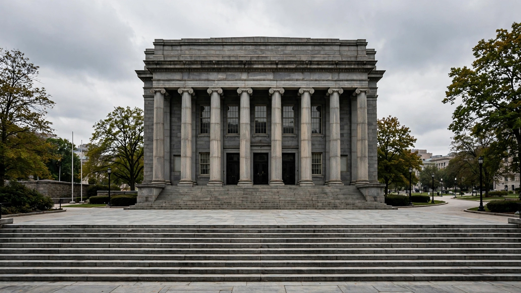 A stone federal courthouse building with tall columns and wide steps