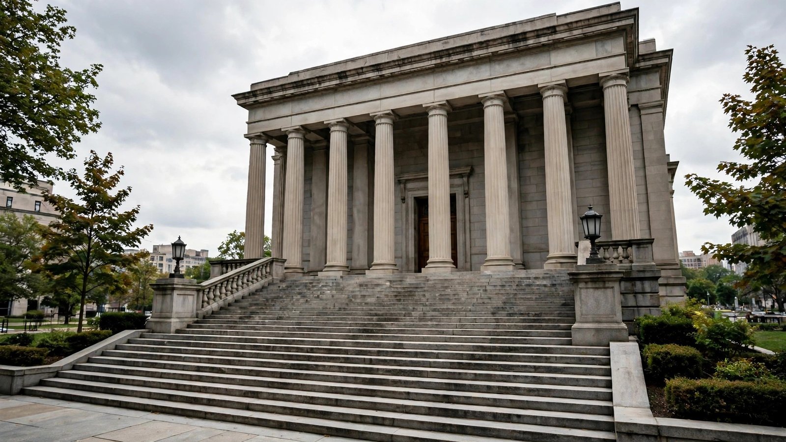 Stone courthouse building with tall columns and wide steps