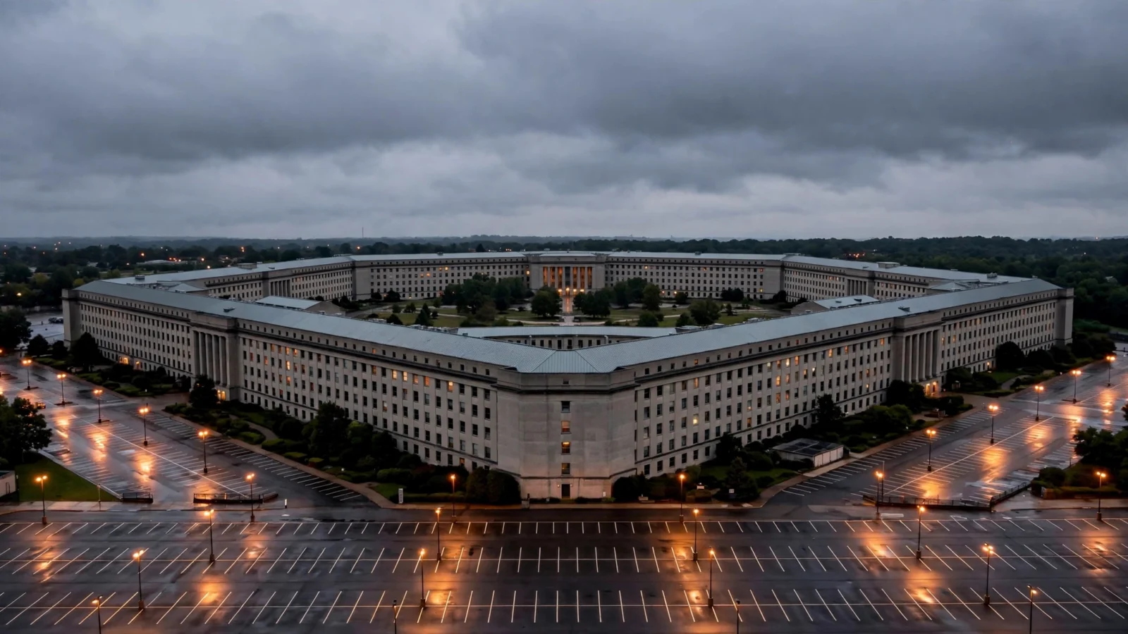 Aerial view of the Pentagon building and its parking lots under a cloudy evening sky